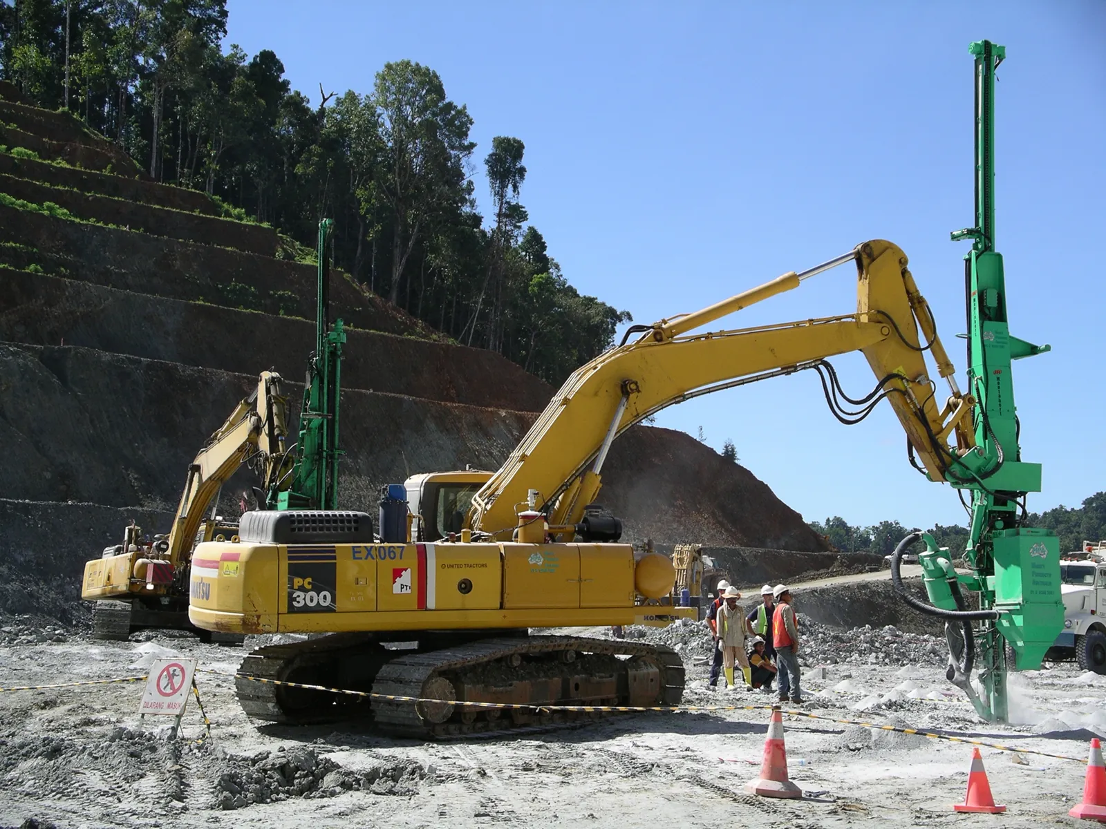 Montabert CPA on a Komatsu PC300 drilling production holes at Gosawong