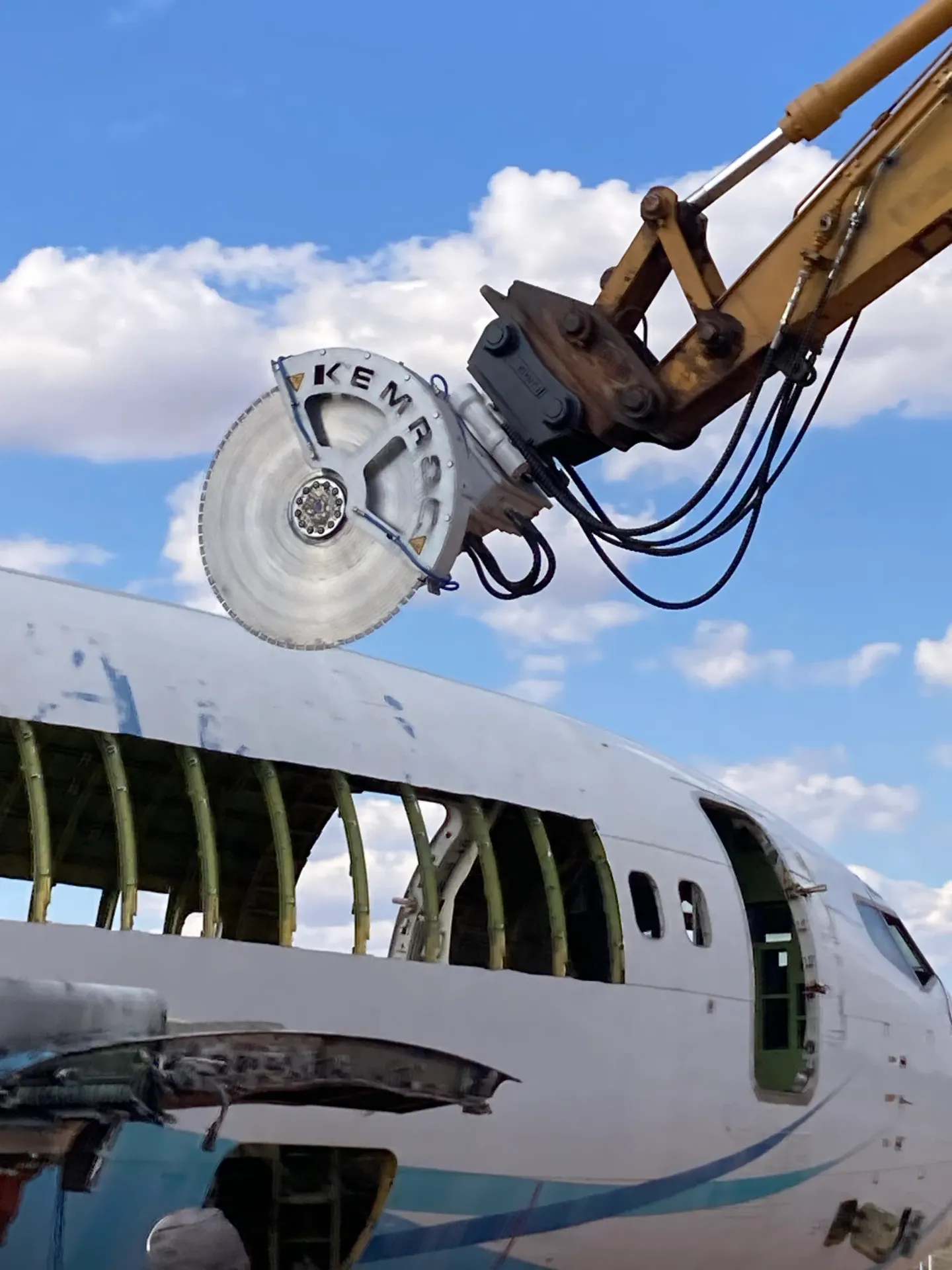 Kemroc KDS diamond saw cutting an aircraft fuselage during recycling