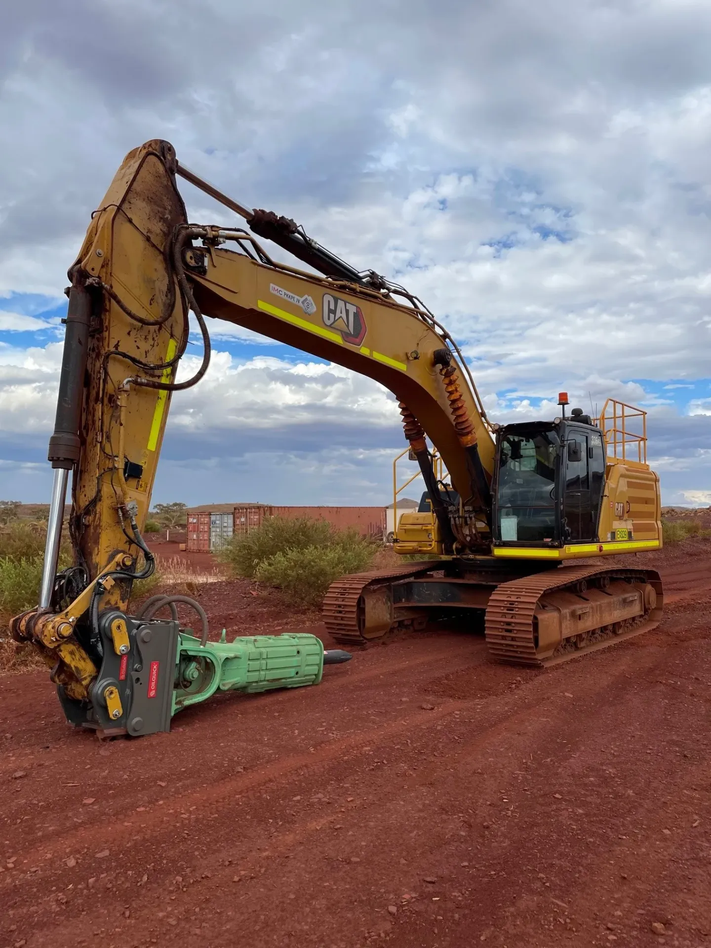Cat excavator with Montabert V45 breaker on OilQuick OQ80 coupler