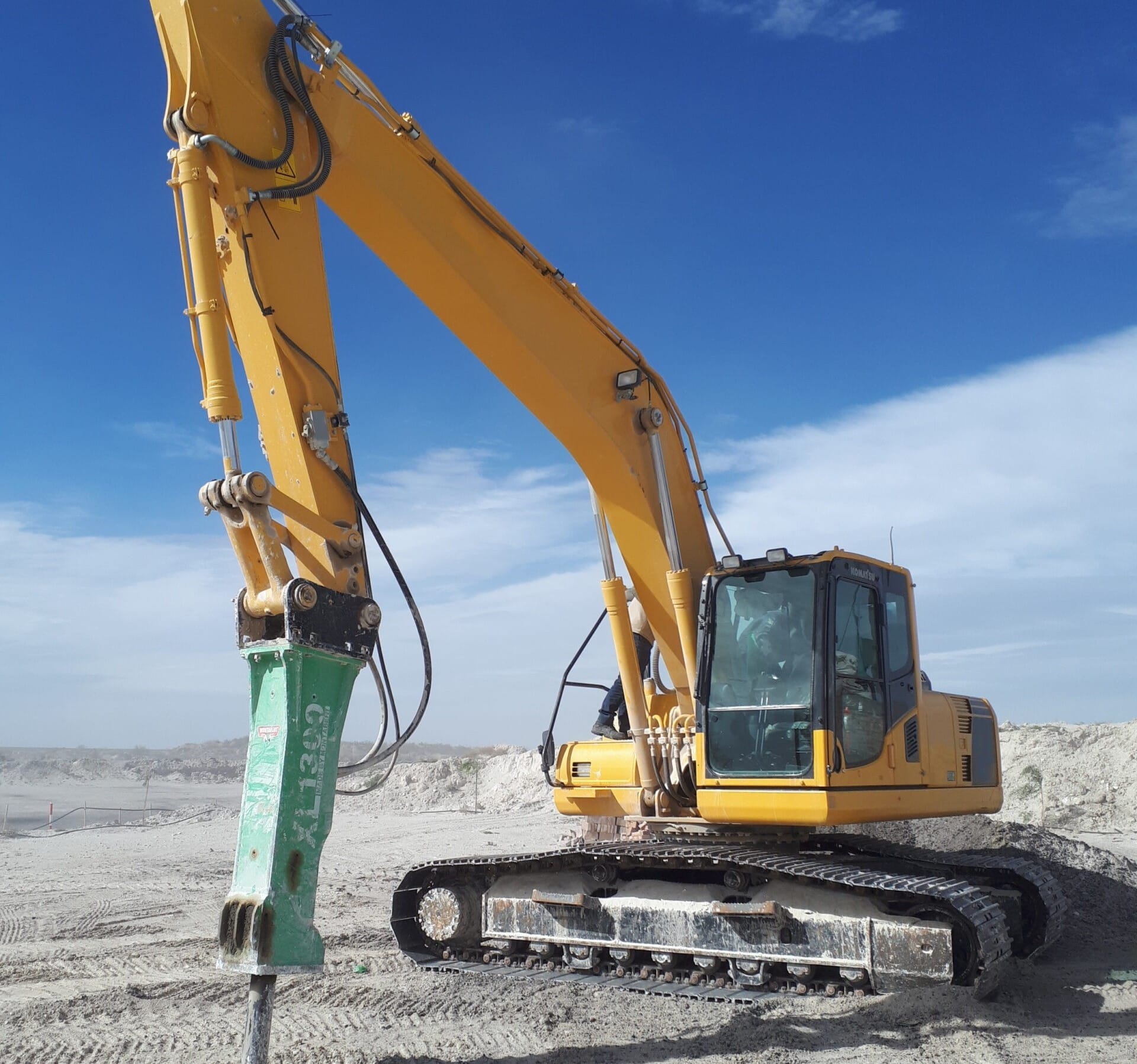 Montabert XL1300 hydraulic breaker working on site